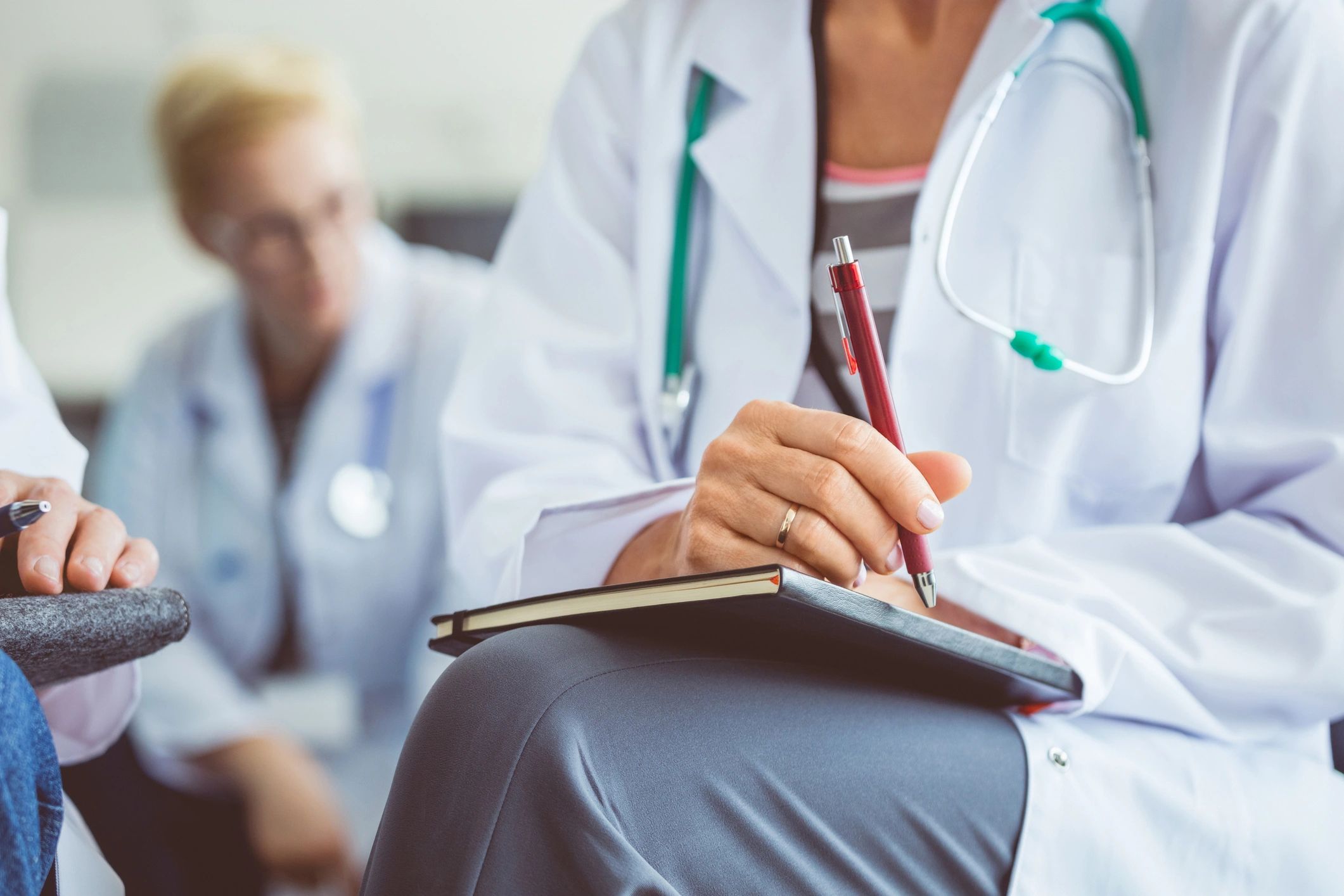 Medical students engaged in practice.